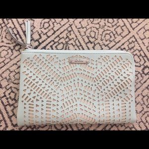 Soft mint perforated double clutch